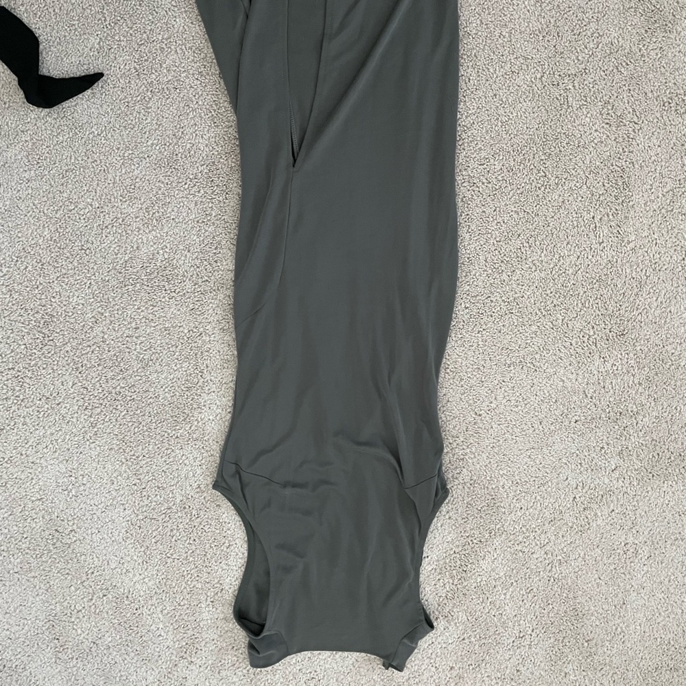 Fashion nova olive greens dress with a small slit